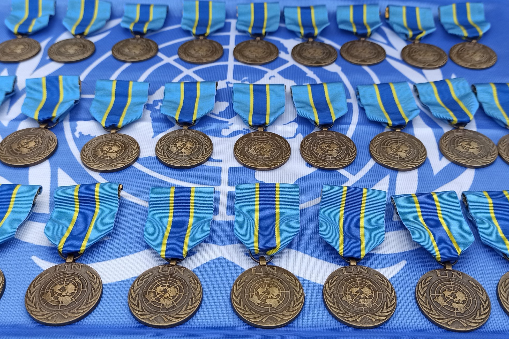 Какие медали украины. Награды ООН для миротворцев. Миротворец ООН медали. Медали голубых касок ООН.